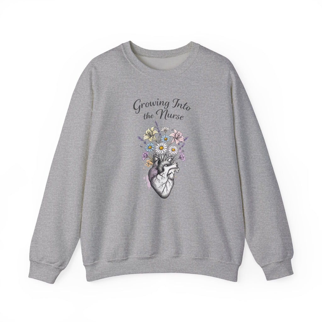 Gray sweatshirt with floral and anatomical heart design on a white background